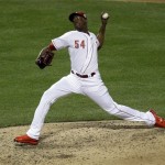 National League's Aroldis Chapman, of the Cincinnati Reds, throws during the seventh inning of the MLB All-Star baseball game, on Tuesday, July 16, 2013, in New York. (AP Photo/Julio Cortez)