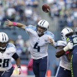 Tennessee Titans quarterback Ryan Fitzpatrick fumbles as he attempts a pass under pressure from Seattle Seahawks' Tony McDaniel (99) in the second half of an NFL football game, Sunday, Oct. 13, 2013, in Seattle. (AP Photo/Elaine Thompson)