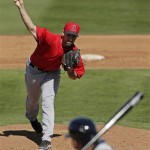 Los Angeles Angels pitcher Brandon Hynick throws to Seattle Mariners' Kendrys Morales during an exhibition spring training baseball game Monday, Feb. 25, 2013, in Peoria, Ariz. (AP Photo/Charlie Riedel)