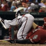 Arizona Diamondbacks' Cody Ross falls after being hit by a foul ball during the fourth inning of a baseball game against the St. Louis Cardinals, Wednesday, June 5, 2013, in St. Louis. (AP Photo/Jeff Roberson)