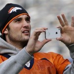 Denver Broncos quarterback Brock Osweiler takes pictures as he looks around in MetLife Stadium before the team's walk-through on Saturday, Feb. 1, 2014, in East Rutherford, N.J. The Broncos are scheduled to play the Seattle Seahawks in the NFL Super Bowl XLVIII football game Sunday. (AP Photo/Mark Humphrey)