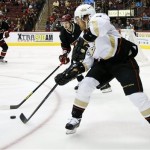 Anaheim Ducks' Teemu Selanne looks to pass against the Phoenix Coyotes during the first period of an NHL hockey game, Monday, March 4, 2013, in Glendale, Ariz. (AP Photo/Matt York)