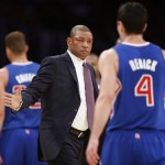  Los Angeles Clippers coach Doc Rivers, left, congratulates J.J. Redick, right, as he comes to the bench during a stop in play in the first half of an NBA basketball game against the Los Angeles Lakers in Los Angeles, Tuesday, Oct. 29, 2013. (AP Photo/Danny Moloshok)