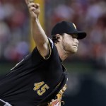 Pittsburgh Pirates starter Gerrit Cole pitches to a St. Louis Cardinals batter in the first inning of Game 5 of a National League baseball division series, Wednesday, Oct. 9, 2013, in St. Louis. (AP Photo/Charlie Riedel)