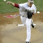 Arizona Diamondbacks pitcher Trevor Cahill delivers a pitch against the Texas Rangers during the first inning of an interleague baseball game, Monday, May 27, 2013, in Phoenix. (AP Photo/Matt York)