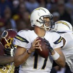  San Diego Chargers quarterback Philip Rivers looks for an open man to pass during the second half of a NFL football game against Washington Redskins in Landover, Md., Sunday, Nov. 3, 2013. (AP Photo/Alex Brandon)