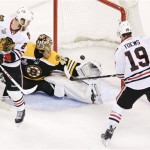 Chicago Blackhawks center Jonathan Toews (19) scores a goal past Boston Bruins goalie Tuukka Rask (40), of Finland, during the second period in Game 4 of the NHL hockey Stanley Cup Finals, Wednesday, June 19, 2013, in Boston. (AP Photo/Charles Krupa)