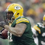 Green Bay Packers' Johnny Jolly reacts after recovering a fumble during the second half of an NFL football game against the Atlanta Falcons Sunday, Dec. 8, 2013, in Green Bay, Wis. (AP Photo/Tom Lynn)