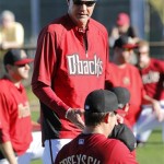 Arizona Diamondbacks manager Kirk Gibson talks with catcher Tuffy Gosewisch during spring training baseball practice, Tuesday, Feb. 11, 2014, in Scottsdale, Ariz. (AP Photo/Matt York)