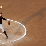 Arizona State's Dallas Escobedo pitches against Florida in the first inning of a Women's College World Series championship series game in Oklahoma City, Tuesday, June 7, 2011. (AP Photo/Sue Ogrocki)