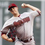 Arizona Diamondbacks' Patrick Corbin pitches in the first inning of a baseball game against the Boston Red Sox in Boston, Saturday, Aug. 3, 2013. (AP Photo/Michael Dwyer)
