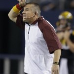 Arizona State coach Todd Graham signals from the sidelines during the first half of an NCAA college football game against Notre Dame on Saturday, Oct. 5, 2013, in Arlington, Texas. (AP Photo/LM Otero)