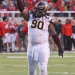 Arizona State defensive tackle Will Sutton (90) celebrates after a teammate made an interception in the fourth quarter during an NCAA college football game against Utah on Saturday, Nov. 9, 2013, in Salt Lake City. Arizona State won 20-19. (AP Photo/Rick Bowmer)
