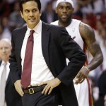 Miami Heat head coach Erik Spoelstra and Miami Heat small forward LeBron James (6) move on the court during the first half of Game 7 in their NBA basketball Eastern Conference finals playoff series against the Indiana Pacers, Monday, June 3, 2013 in Miami. (AP Photo/Lynne Sladky)