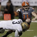 Bowling Green quarterback Matt Johnson (11) is sacked by Pittsburgh linebacker Nicholas Grigsby (3) during the first half of the Little Caesars Pizza Bowl NCAA college football game, Thursday, Dec. 26, 2013, in Detroit. (AP Photo/Carlos Osorio)