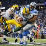 Detroit Lions defensive tackle Ndamukong Suh (90) sacks Green Bay Packers quarterback Matt Flynn for a safety during the third quarter of an NFL football game at Ford Field in Detroit, Thursday, Nov. 28, 2013. (AP Photo/Paul Sancya)