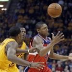 Washington Wizards' Bradley Beal, right, loses control of the ball under pressure from the Cleveland Cavaliers in the first quarter of an NBA basketball game Tuesday, Oct. 30, 2012, in Cleveland. (AP Photo/Mark Duncan)