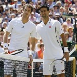 Andy Murray of Britain, left, and Novak Djokovic of Serbia pose for photographers at the net before the Men's singles final match at the All England Lawn Tennis Championships in Wimbledon, London, Sunday, July 7, 2013. (AP Photo/Kirsty Wigglesworth)
