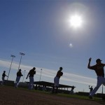 Arizona Diamondbacks pitches throw during spring training baseball practice, Tuesday, Feb. 11, 2014, in Scottsdale, Ariz. (AP Photo/Matt York)