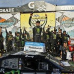 Kyle Busch celebrates in Victory Lane after winning the NASCAR Nationwide Series auto race Saturday, March 2, 2013, in Avondale, Ariz. (AP Photo/Ross D. Franklin)