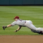 Arizona Diamondbacks shortstop Willie Bloomquist dives for a ball hit by Washington Nationals' Jayson Werth during the third inning of a baseball game at Nationals Park in Washington, Tuesday, June 25, 2013. Werth singled on the play. (AP Photo/Susan Walsh)