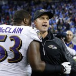 Baltimore Ravens head coach John Harbaugh hugs inside linebacker Jameel McClain after their 18-16 win over the Detroit Lions in an NFL football game in Detroit, Monday, Dec. 16, 2013. (AP Photo/Rick Osentoski)