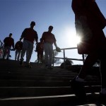 Los Angeles Angels players make their way to the practice fields for a spring training baseball workout Tuesday, Feb. 12, 2013, in Tempe, Ariz. (AP Photo/Morry Gash)