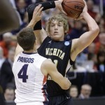 Gonzaga's Kevin Pangos (4) guards Wichita State's Ron Baker (31) in the first half during a third-round game in the NCAA men's college basketball tournament in Salt Lake City Saturday, March 23, 2013. (AP Photo/Rick Bowmer)
