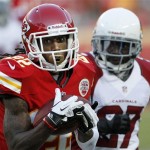 Kansas City Chiefs running back Dexter McCluster (22) catches a pass while covered by Arizona Cardinals defensive back Michael Adams (27) during the first half of an NFL preseason football game in Kansas City, Mo., Friday, Aug. 10, 2012. (AP Photo/Colin E. Braley)