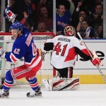 New York Rangers' Artem Anisimov (42) celebrates a goal by Ryan Callahan as Ottawa Senators goalie Craig Anderson (41) looks away during the first period of Game 1 of a first-round NHL hockey playoff series, Thursday, April 12, 2012, in New York. (AP Photo/Frank Franklin II)