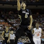  Colorado's Askia Booker (0) shoots against Illinois during the first half of a second-round game of the NCAA college basketball tournament on Friday, March 22, 2013, in Austin, Texas. (AP Photo/David J. Phillip)
