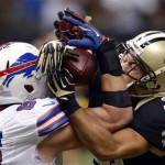 New Orleans Saints defensive back Chris Carr (31) breaks up a pass intended for Buffalo Bills tight end Scott Chandler (84) during the first half of an NFL football game in New Orleans, Sunday, Oct. 27, 2013. (AP Photo/Bill Feig)