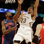 Team Webber's Anthony Davis of the New Orleans Pelicans shoots as Team Hill's Andre Drummond of the Detroit Pistons defends during the Rising Star NBA All Star Challenge Basketball game, Friday, Feb. 14, 2014, in New Orleans. (AP Photo/Gerald Herbert)