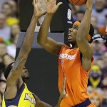 Syracuse forward C.J. Fair (5) shoots over Marquette forward Jamil Wilson (0) during the second half of the East Regional final in the NCAA men's college basketball tournament, Saturday, March 30, 2013, in Washington. (AP Photo/Alex Brandon)