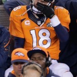 Denver Broncos' Peyton Manning watches play against the Seattle Seahawks during the second half of the NFL Super Bowl XLVIII football game Sunday, Feb. 2, 2014, in East Rutherford, N.J. (AP Photo/Charlie Riedel)