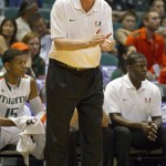 Miami head coach Jim Larranaga encourages his team as they play Arizona in the first half of an NCAA college basketball game in the Diamond Head Classic Sunday, Dec. 23, 2012, in Honolulu. (AP Photo/Eugene Tanner)