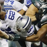  Dallas Cowboys running back DeMarco Murray (29) fumbles the ball against the Philadelphia Eagles during the first half of an NFL football game, Sunday, Dec. 29, 2013, in Arlington, Texas. (AP Photo/Tony Gutierrez)