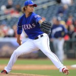 Texas Rangers' Yu Darvish, of Japan, throws in the fourth inning in a spring training baseball game against the Milwaukee Brewers, Monday, March 19, 2012, in Surprise, Ariz. (AP Photo/Ross D. Franklin)
