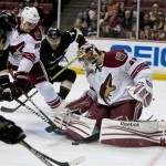Phoenix Coyotes goalie Mike Smith makes a save as Coyotes defenseman Rostislav Klesla (16), from the Czech Republic, helps defend during the second period of an NHL hockey game against the Anaheim Ducks, Sunday, Oct. 23, 2011, in Anaheim, Calif. (AP Photo/Bret Hartman)