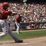 Arizona Diamondbacks' Justin Upton (10) doubles to score Trevor Cahill against the San Francisco Giants during the third inning of a baseball game in San Francisco, Monday, May 28, 2012. (AP Photo/Jeff Chiu)