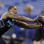 Florida State linebacker Christian Jones makes a catch as he runs a drill at the NFL football scouting combine in Indianapolis, Monday, Feb. 24, 2014. (AP Photo/Michael Conroy)