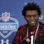 Brigham Young defensive lineman Ziggy Ansah answers a question during a news conference at the NFL football scouting combine in Indianapolis, Saturday, Feb. 23, 2013. (AP Photo/Michael Conroy)
