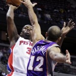 Detroit Pistons guard Rodney Stuckey (3) shoots against Phoenix Suns guard Kendall Marshall (12) in the second half of an NBA basketball game, Wednesday, Nov. 28, 2012, in Auburn Hills, Mich. Stuckey scored 18 points as the Pistons won 117-77. (AP Photo/Duane Burleson)