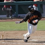 San Francisco Giants' Pablo Sandoval hits an RBI single during the fourth inning of an exhibition spring training baseball game against the Los Angeles Angels Saturday, Feb. 23, 2013, in Scottsdale, Ariz. (AP Photo/Darron Cummings)

