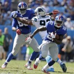 New York Giants' David Wilson (22) runs against the Carolina Panthers during the second half of an NFL football game in Charlotte, N.C., Sunday, Sept. 22, 2013. (AP Photo/Bob Leverone)