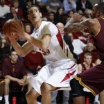 Stanford forward Dwight Powell (33) drives to the basket in front of Arizona State forward Kyle Cain during the first half of an NCAA college basketball game in Palo Alto, Calif., Thursday, Feb. 2, 2012. (AP Photo/Paul Sakuma)
