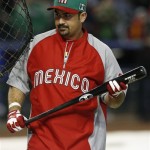 Mexico's Adrian Gonzalez steps in to take batting practice prior to a World Baseball Classic baseball game between Mexico and the United States on Friday, March 8, 2013, in Phoenix. (AP Photo/Ross D. Franklin)
