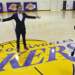 Newly acquired Los Angeles Lakers guard Steve 
Nash poses at center court for team 
photographer Andrew Bernstein after a news 
conference at the NBA basketball team's 
headquarters in El Segundo, Calif., 
Wednesday, July 11, 2012. The Lakers acquired 
two-time MVP Nash from the Phoenix Suns in 
exchange for first-round draft picks in 2013 
and 2015 as well as second-round draft picks 
in 2013 and 2014, Lakers general manager 
Mitch Kupchak said. (AP Photo/Reed Saxon)