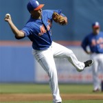 New York Mets shortstop Ruben Tejada throws to first during a workout before an exhibition spring training baseball game against the St. Louis Cardinals, Wednesday, Feb. 27, 2013, in Port St. Lucie, Fla. (AP Photo/Julio Cortez)
