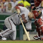 Arizona Diamondbacks' Aaron Hill falls to the ground after getting hit by a pitch from Washington Nationals reliever Ryan Mattheus during the seventh inning of a baseball game at Nationals Park in Washington, Tuesday, May 1, 2012. (AP Photo/Susan Walsh)